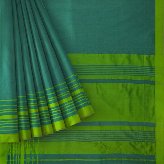 A folded and draped green and teal silk saree with a wide lime green border and metallic blue stripes.